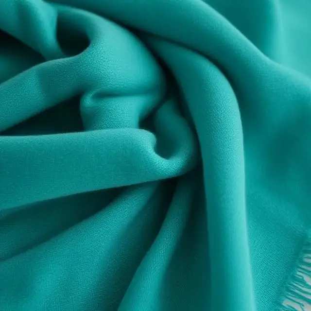 The soft fold of a cashmere wrap